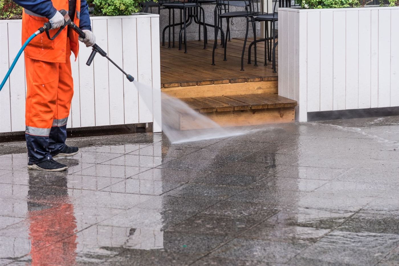 Pressure washing a commercial patio